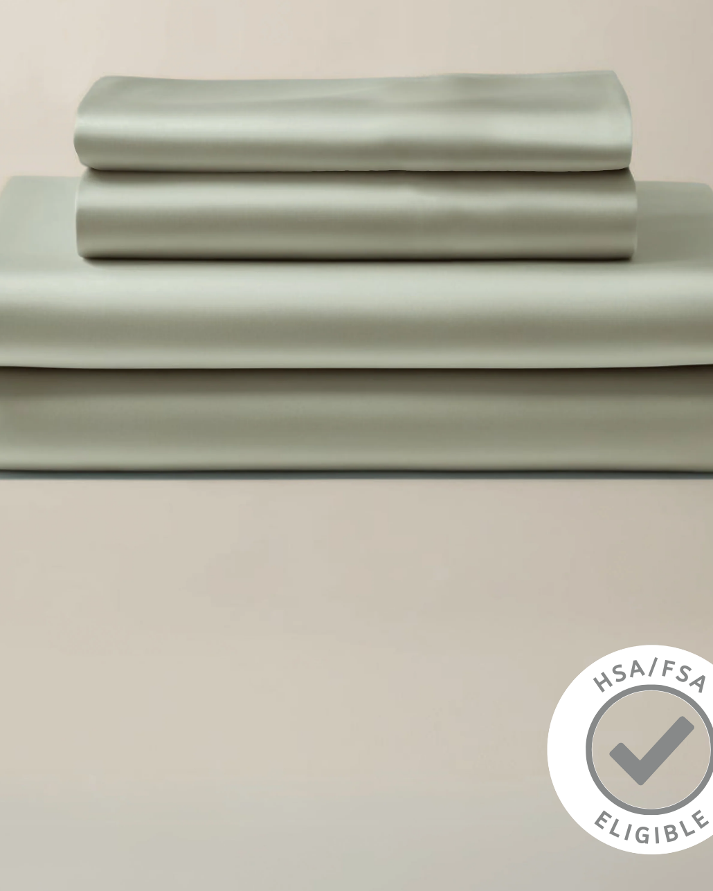 Set of light green bedding sheets on a beige background with a certification logo.