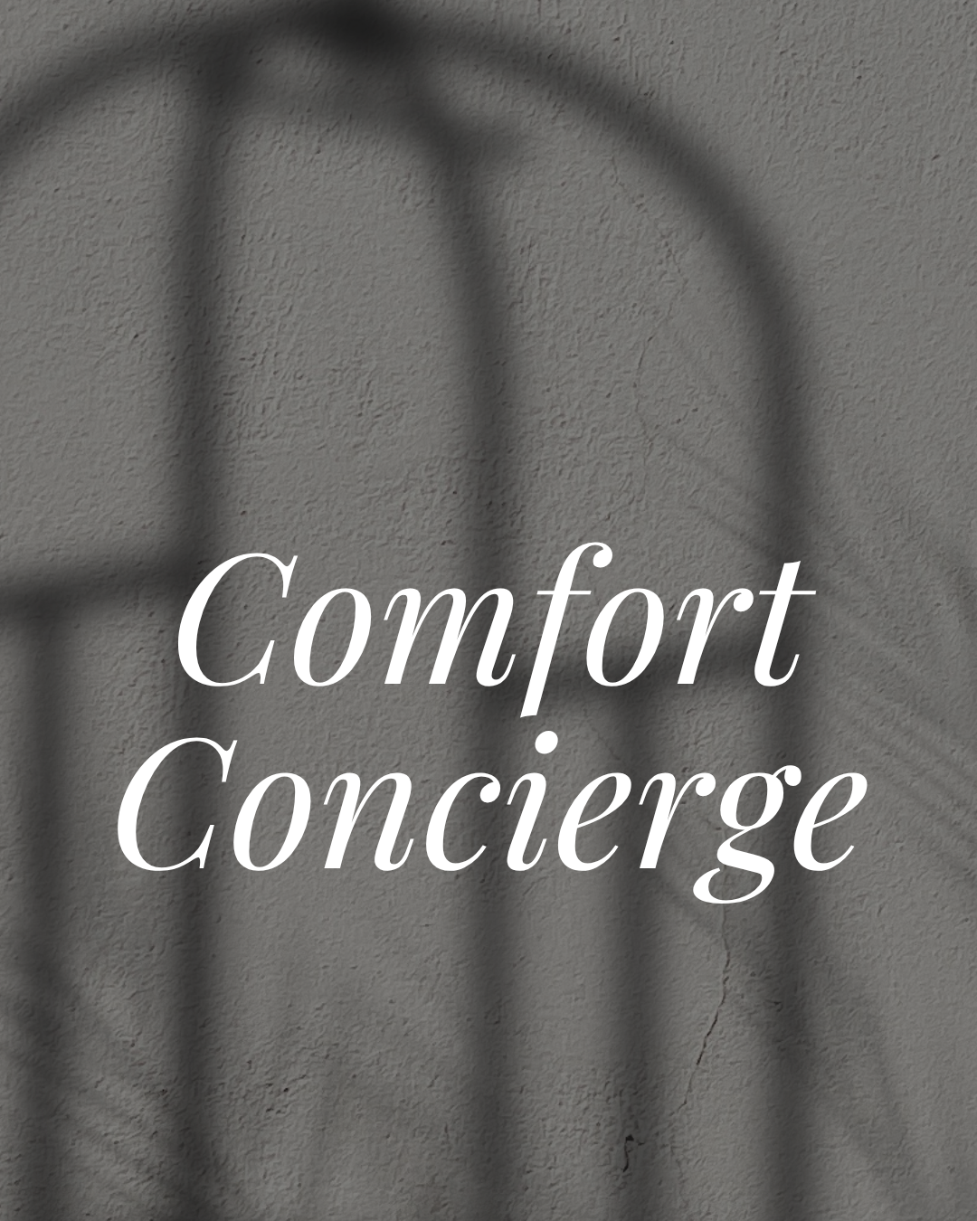 Text 'Comfort Concierge' on a textured gray background