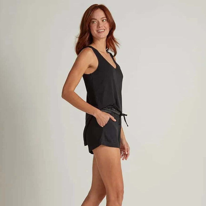black shorts with a drawstring worn by a person on a plain background. The fabric looks light and breathable.