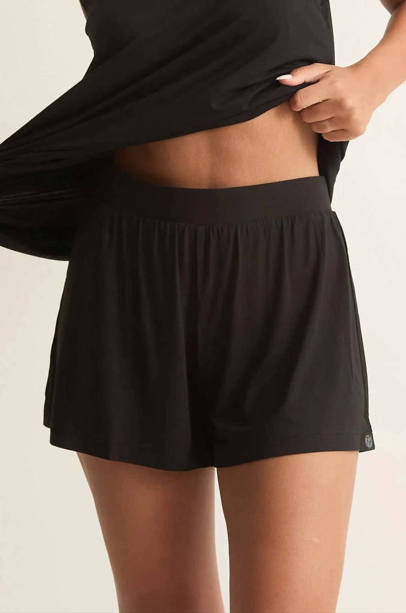 A pair of black, relaxed fit lounge shorts with a smooth waistband, designed for comfort and mobility.
